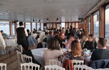 The participants are enjoying the dinner